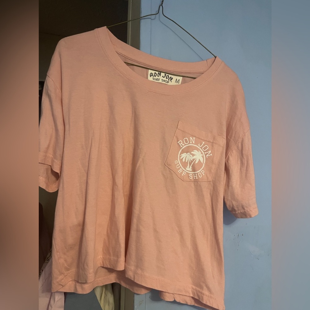 Pink Ron Jon slightly cropped tee